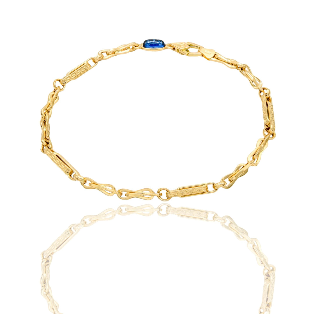 Bracciale Oro Giallo Oro 18 carati Catena Alternata Con Greca pietra blu cm. 21,5