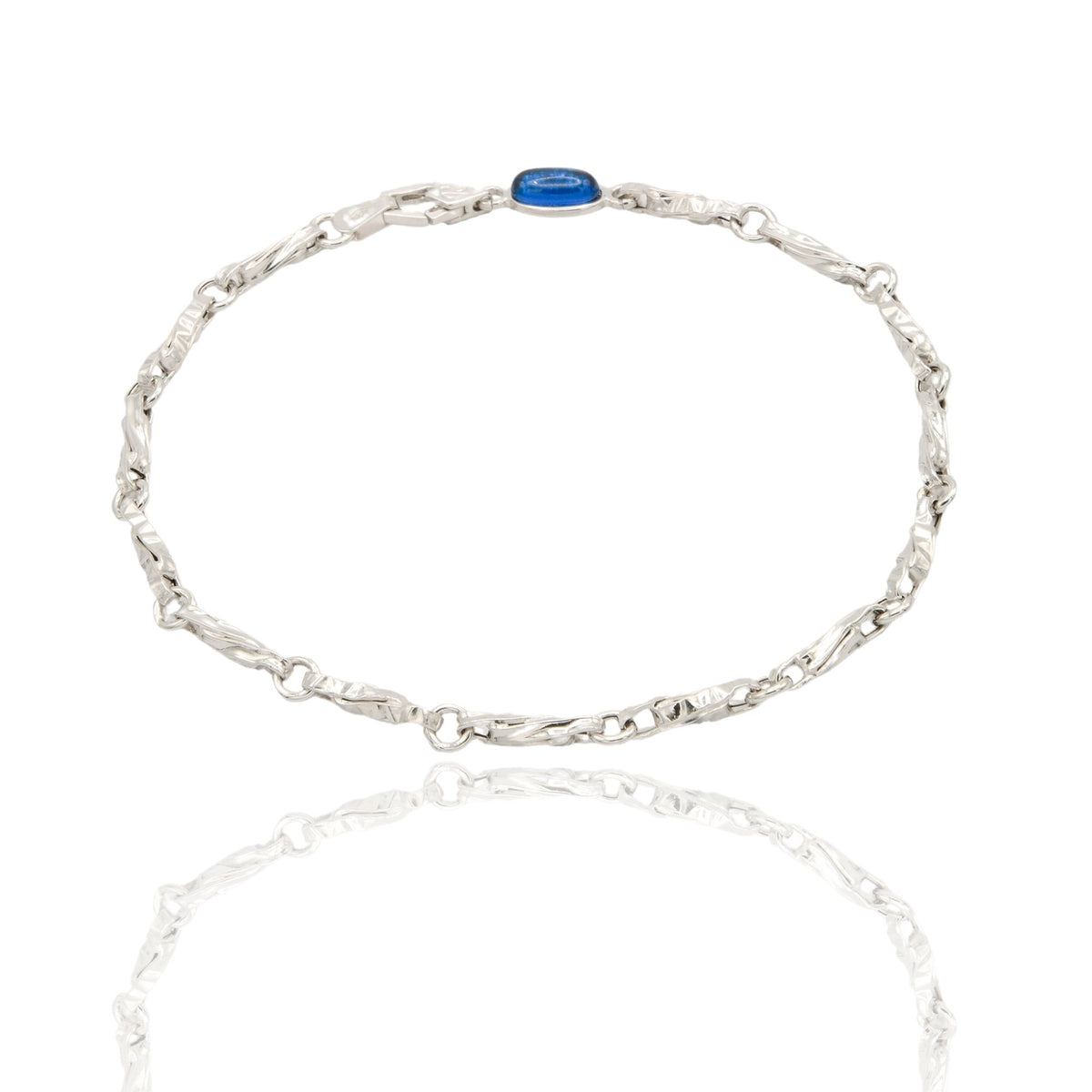 Bracciale Oro Bianco Oro 18 carati Catena Intrecciata E Rigata pietra blu cm. 21,5