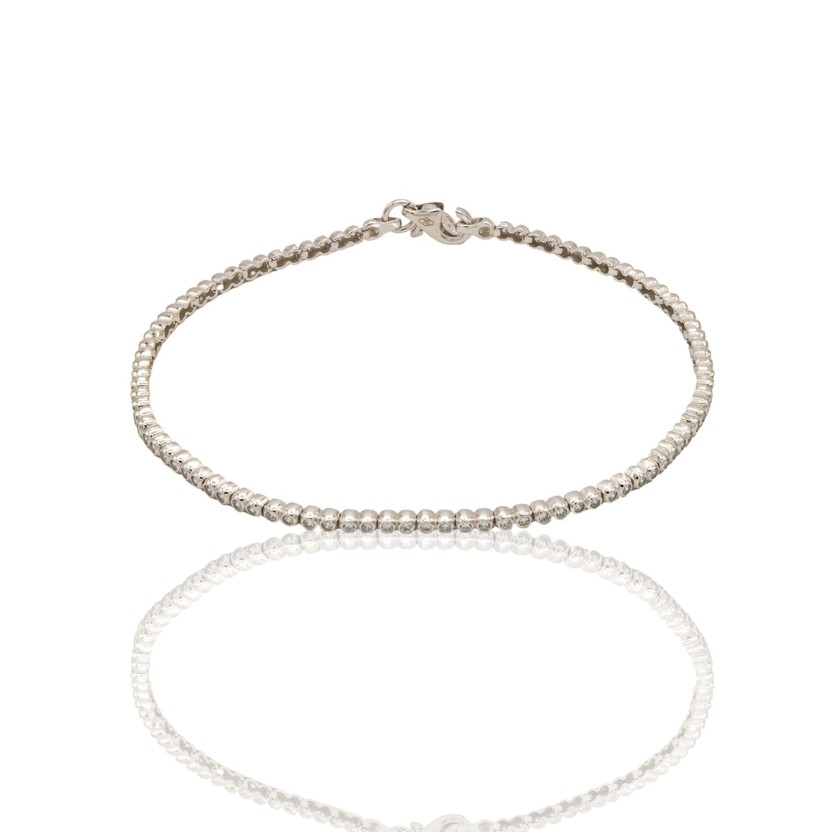 Bracciale Oro Bianco Oro 18 carati Tennis montatura tonda Zirconi Bianchi lunghezza 19cm spessore mm 2