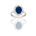 Anello Oro Bianco Oro 18 carati Modello Kate Centro E Contorno Zirconi Bianchi, Zircone Blu 