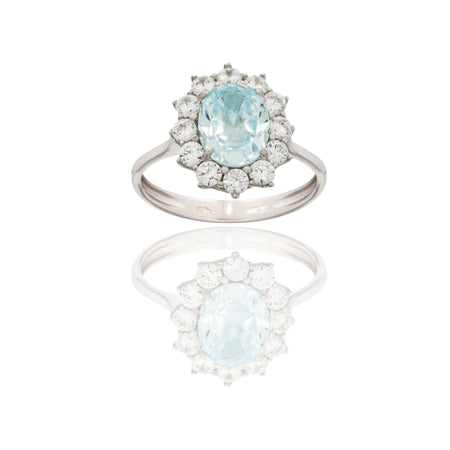 Anello Oro Bianco Oro 18 carati Modello Kate Centro E Contorno Zirconi Bianchi, Zircone Azzurro 