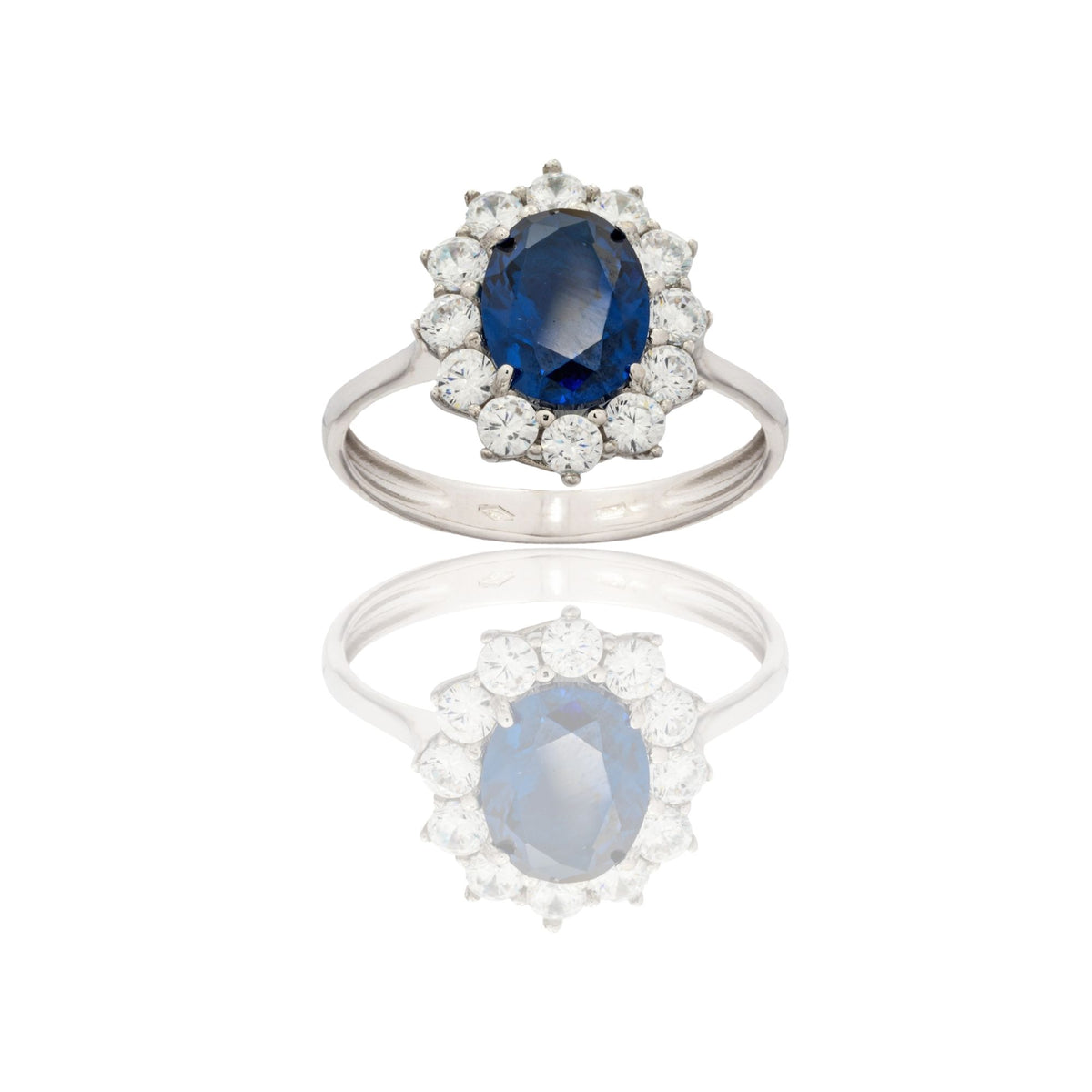 Anello Oro Bianco Oro 18 carati Modello Kate Centro E Contorno Zirconi Bianchi, Zircone Blu spessore gambo mm. 2,7  spessore pietra centrale 9 , con contorno 15 