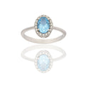 Anello Oro Bianco Oro 18 carati Ovale Centro E Contorno Zirconi Bianchi, Zircone Azzurro 