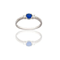 Anello Oro Bianco Oro 18 carati Mezza Veretta Con Centrale Zircone Blu, Zirconi Bianchi spessore gambo mm. 1,7  spessore pietre 4