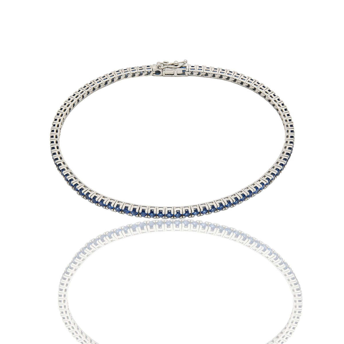 Bracciale Oro Bianco Oro 18 carati Tennis rigido Zirconi blu lunghezza 21cm spessore mm 2,3