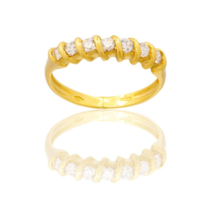 Anello Oro Giallo Oro 18 carati Veretta 7 Pietre Zirconi Bianchi spessore gambo 1,2 mm , spessore pietre 3,8