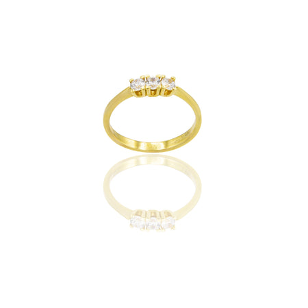 Anello Oro Giallo Oro 18 carati Trilogy 4 griffe Zirconi Bianchi spessore gambo 2,2 mm , spessore pietra 4