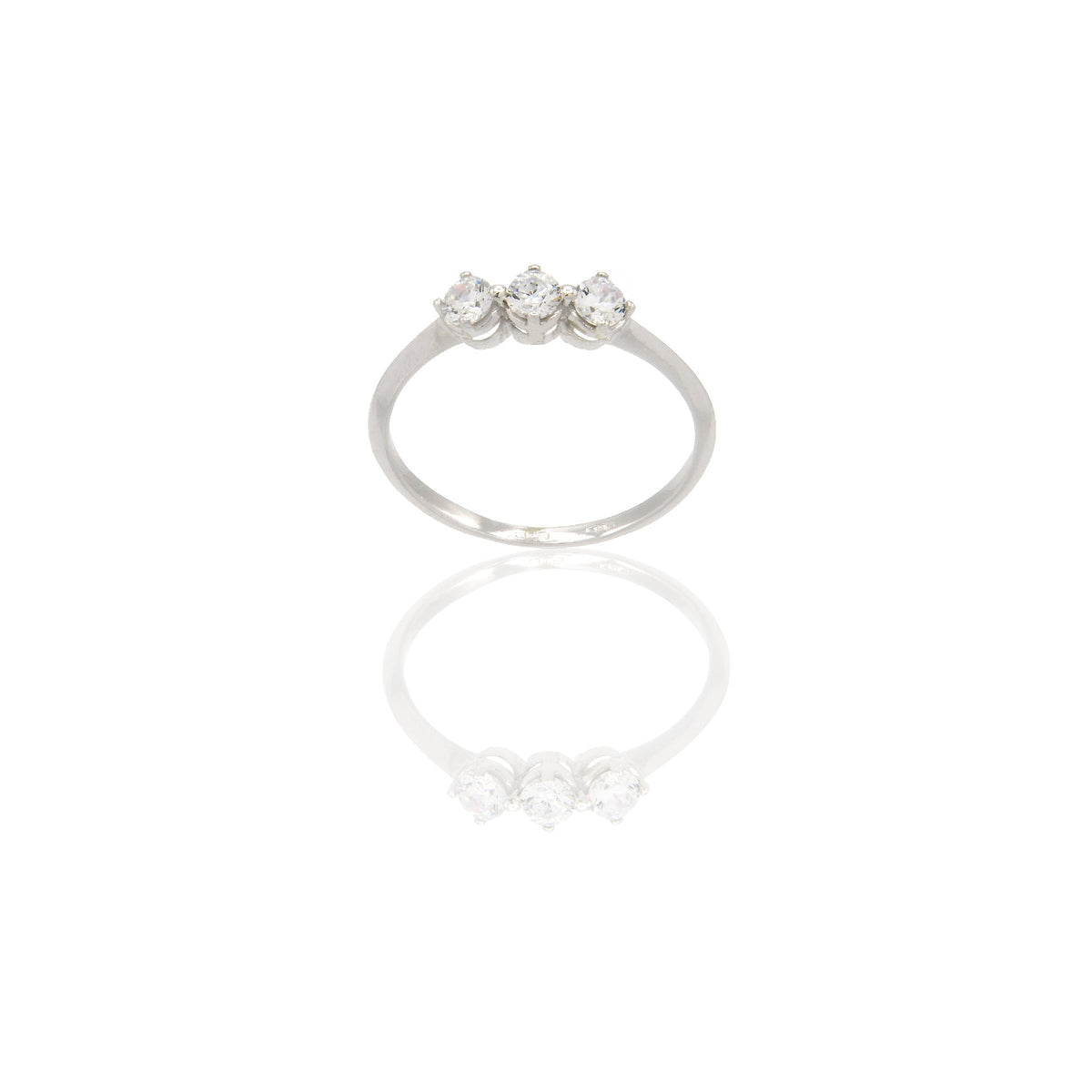 Anello Oro Bianco Oro 18 carati Trilogy 4 griffe Zirconi Bianchi spessore gambo 1,40 mm , spessore pietra 3,5