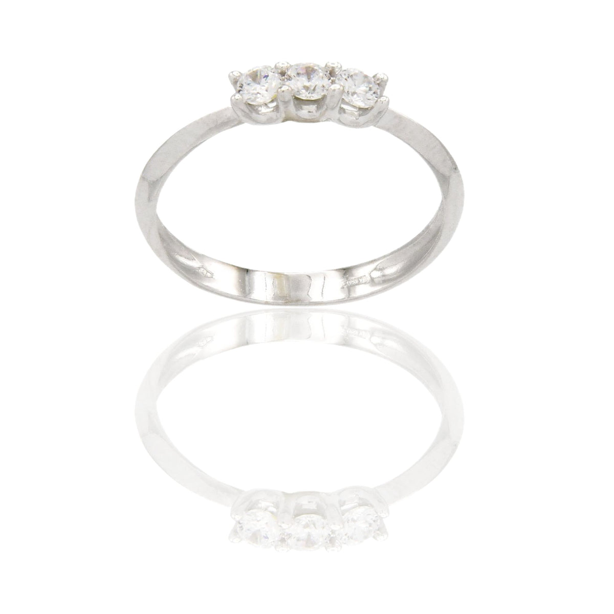 Anello Oro Bianco Oro 18 carati Trilogy 4 griffe Zirconi Bianchi spessore gambo 2,40 mm , spessore pietra 3