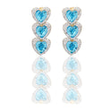 Orecchini Oro Bianco Oro 18 carati Trilogy Cuori  Pendenti Contorno Pave' Zirconi Azzurri, Zirconi Bianchi 